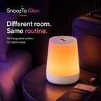 SnoozTo Glow in a travel hotel setting beside luggage and passport